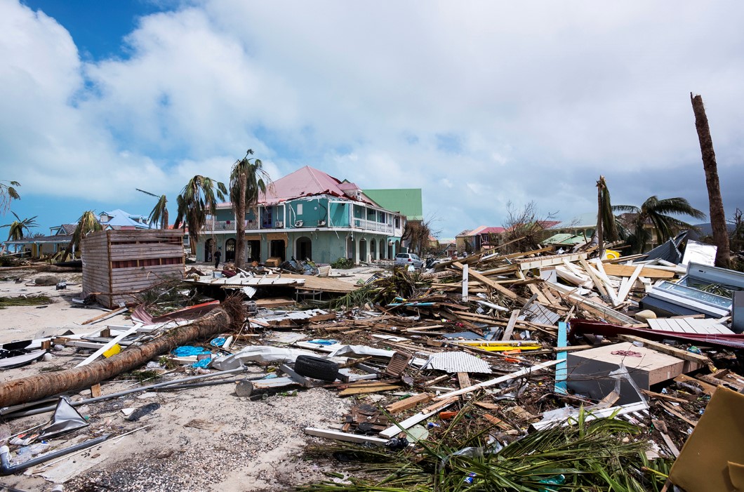 TOPSHOT - A photo taken on September 7, 2017 shows damage in Orient Bay on the French Carribean island of Saint-Martin, after the passage of Hurricane Irma. France, the Netherlands and Britain on September 7 rushed to provide water, emergency rations and rescue teams to territories in the Caribbean hit by Hurricane Irma, with aid efforts complicated by damage to local airports and harbours. The worst-affected island so far is Saint Martin, which is divided between the Netherlands and France, where French Prime Minister Edouard Philippe confirmed four people were killed and 50 more injured.   / AFP PHOTO / Lionel CHAMOISEAU        (Photo credit should read LIONEL CHAMOISEAU/AFP/Getty Images)