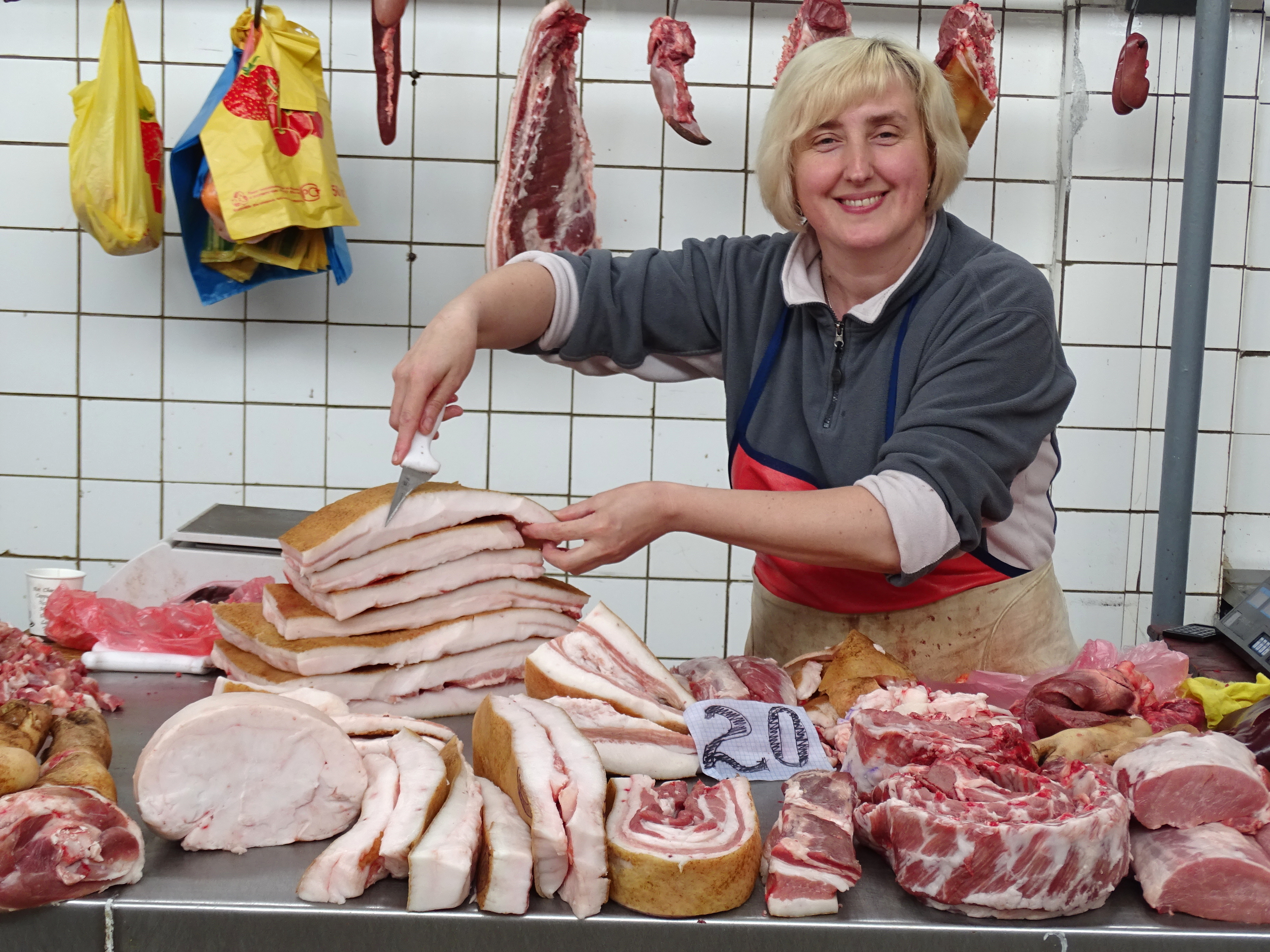 Woman in Market Carves Salo (Pork Fat) - Berdichev - Polissya Region - Ukraine