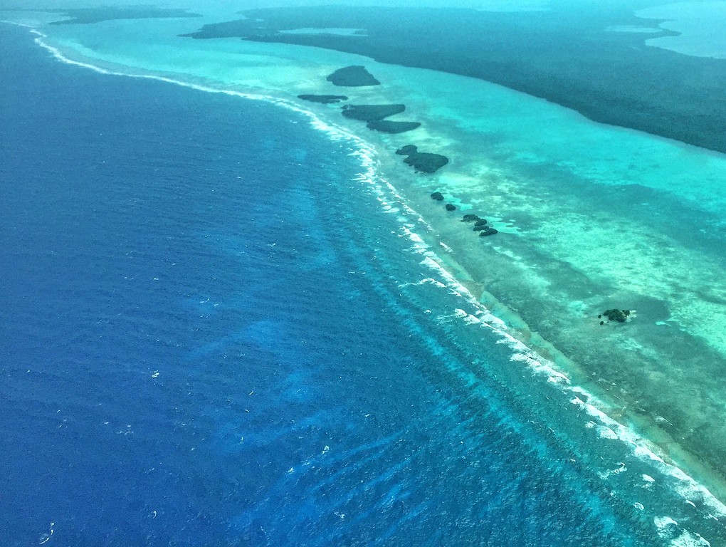 flight over blue hole belize