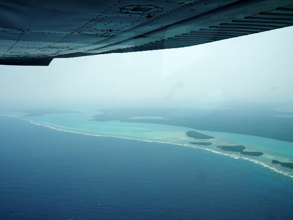 flight blue hole belize