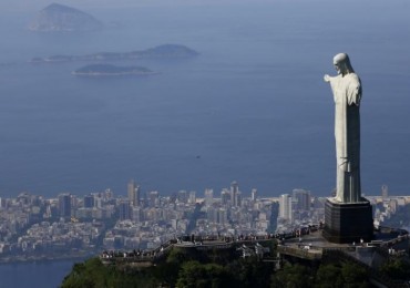 Tourists visit the Christ the Redeemer statue in Rio de Janeiro
