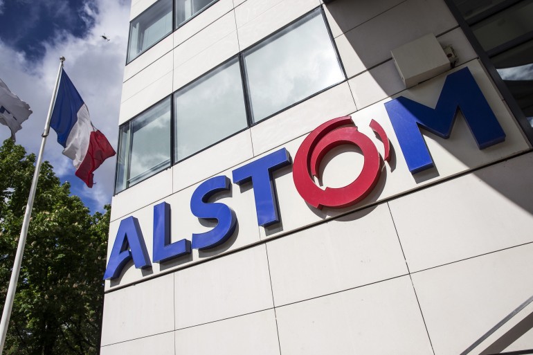 epa04182790 The logo of the French firm Alstom is photographed in Paris, France, 27 April 2014. German group Siemens said 27 April it was available to discuss an alliance with French rival Alstom, upping the ante for US multinational General Electric, which is in talks on buying the French train and power plant builder. In a statement Siemens said it sent Alstom's board of directors a letter 'to signal its willingness to discuss future strategic opportunities.' EPA/ETIENNE LAURENT