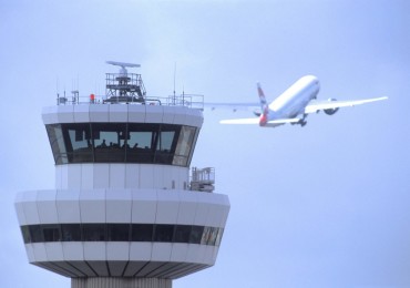 Gatwick Airport, Control tower with aircraft in flight in background, DP, 19 August 2004, (CGA857)